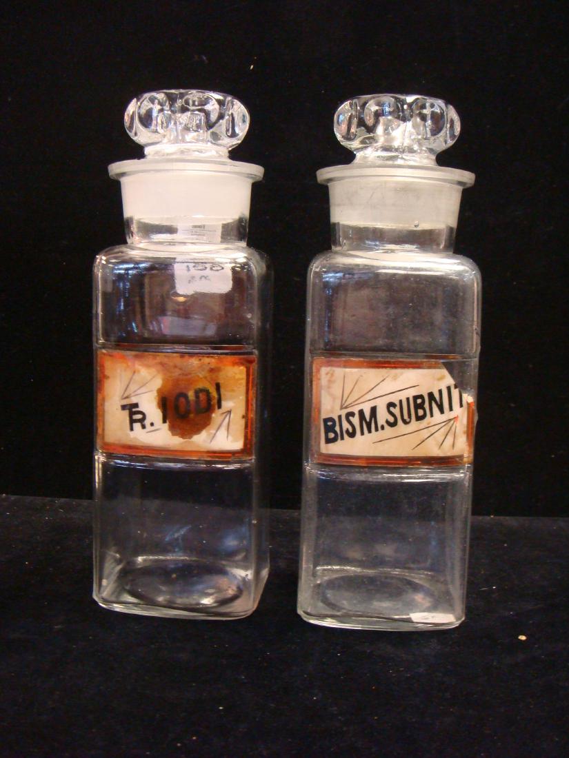 Two Antique Apothecary Bottles with Stoppers, CA 1900: (1 of 3)