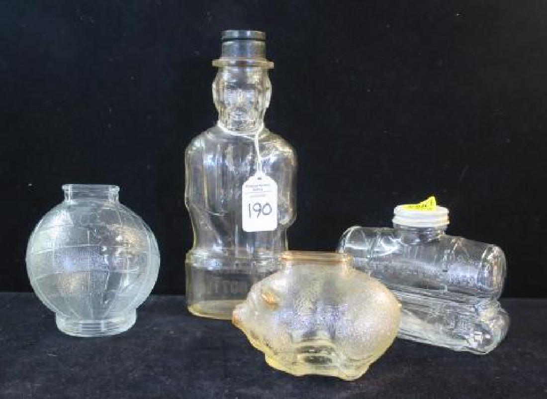 Four Bottle Glass Banks: (1 of 4)