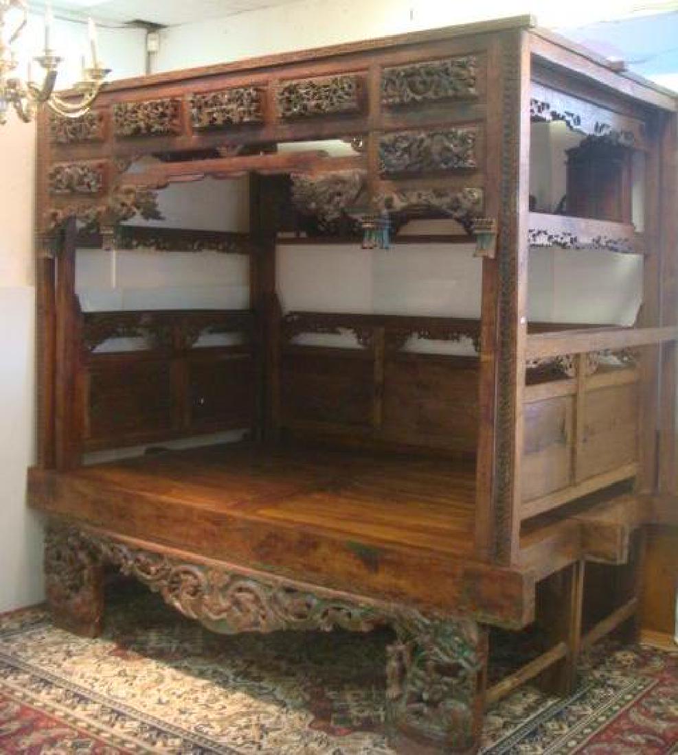 Indonesian Teak Platform Wedding Bed:: Indonesian Teak Platform Wedding Bed: Thirteen Piece Ceremonial Canopy Bed is Hand carved in the Madura Style on All Outer Faces Including High Side Panels, Back and Apron. Decorated in Raised Griffon