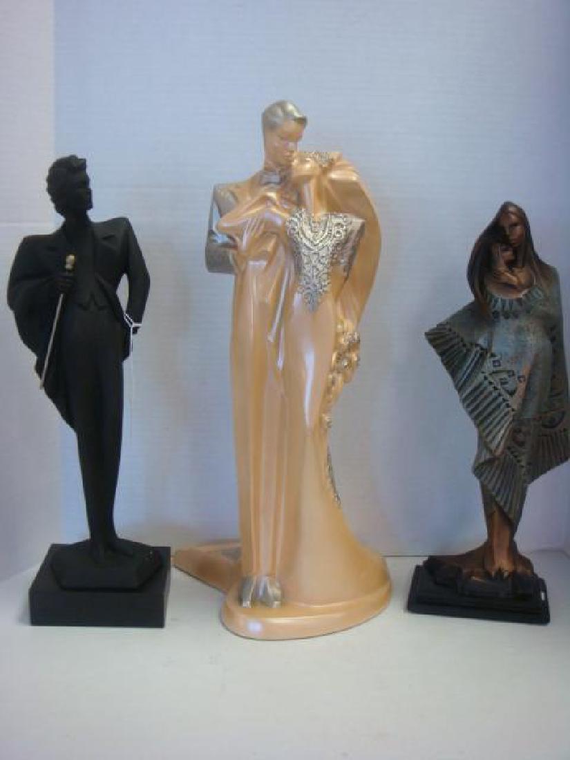 Three 1991 AUSTIN Sculptures by Alexsander Daniel:: Three 1991 AUSTIN Sculptures by Alexsander Daniel: Native American Mother and Child Wrapped in Blanket. 17"T. "Black Tie" with Well Dressed Man in Black and Walking Stick. 18"T. "Our Day" With Wedding