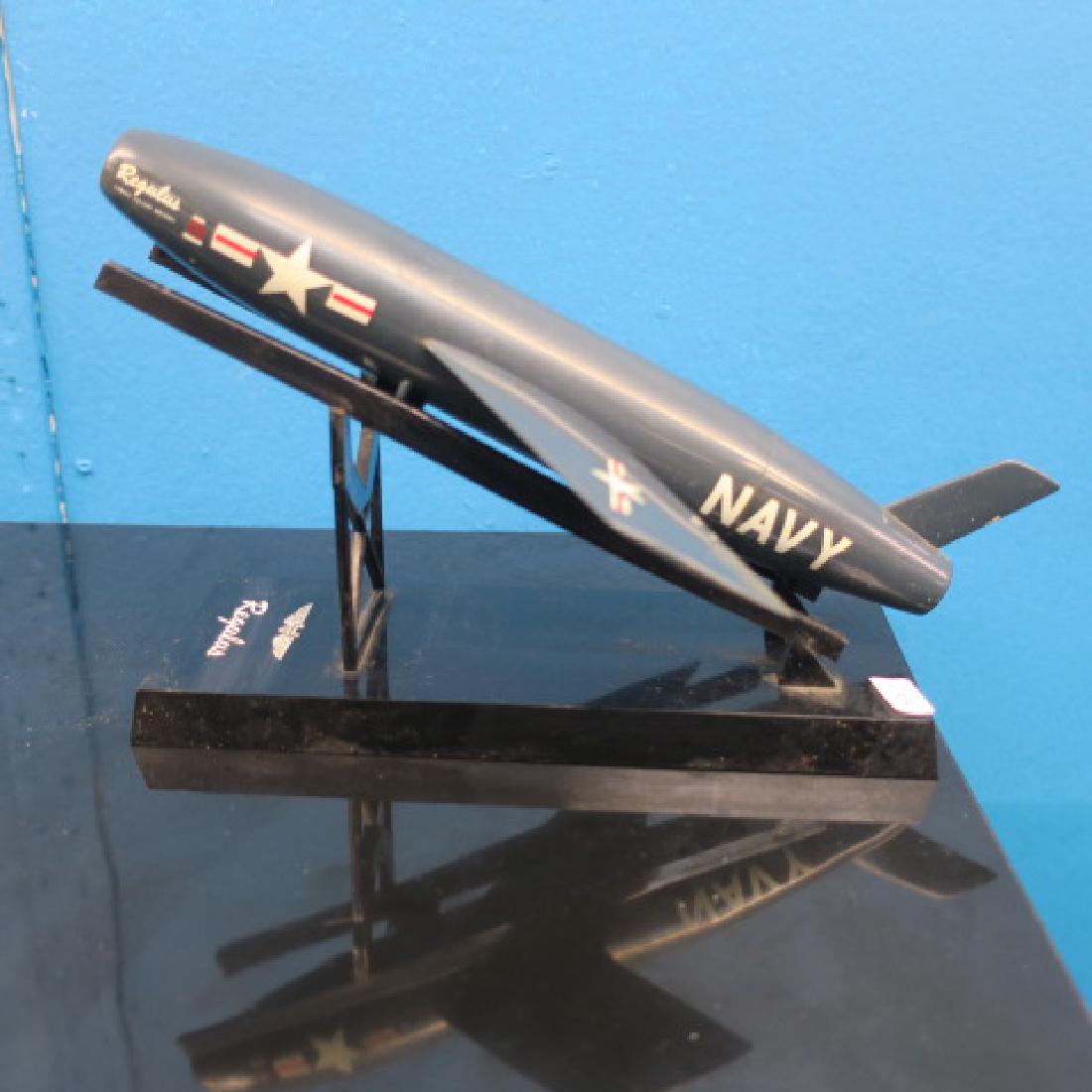 RARE Manufacturers Models of REGULUS Missile on Stand:: RARE Manufacturers Models of REGULUS Missile on Stand: Designed to be a Submarine Launched Nuclear Tipped Weapon for US NAVY Grayback Class submarines. You can see a Real SSM-N8 at the Intrepid Sea Mu