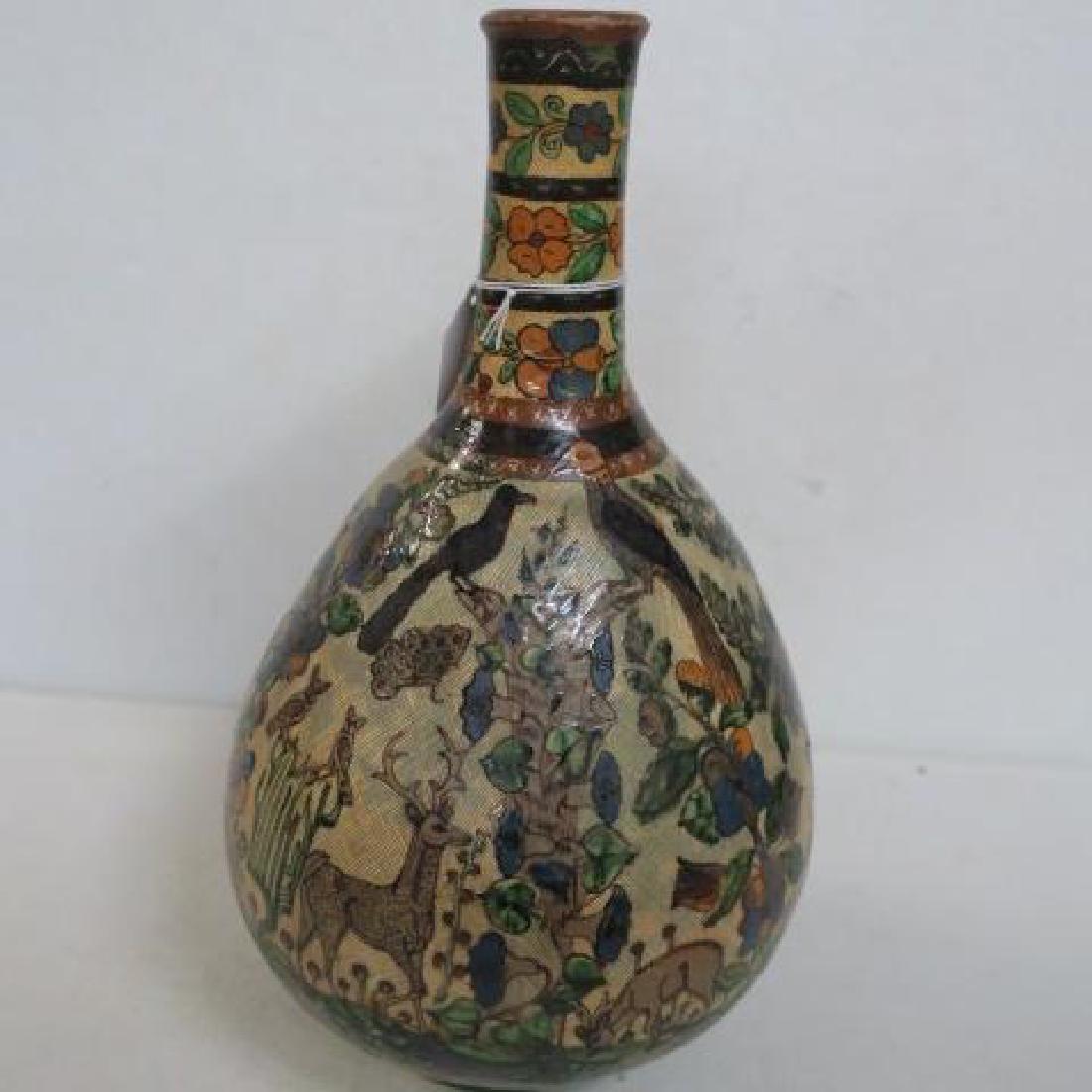 Hand Painted Long Neck Bulbous Vase:: Hand Painted Long Neck Bulbous Vase: Vase has Hand Painted Hunter with Horse, Assorted Animals, Birds, Flowers and Trees. Textured Cross Hatching Background. Illegible Mark on Bottom. 13 1/4"T. Dubbs