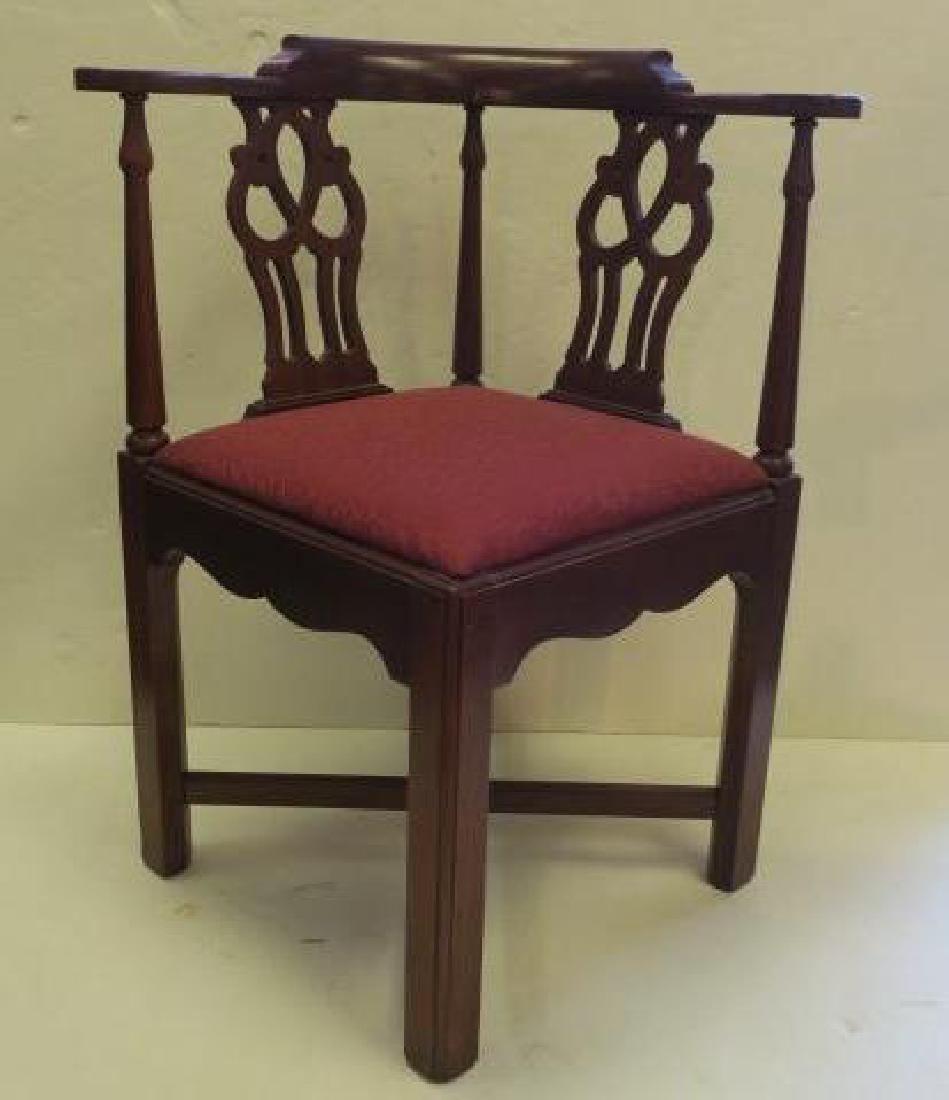 Mahogany Chippendale Style Corner Chair:: Mahogany Chippendale Style Corner Chair: Pillow Crest, Concave Back Supported by Pierced Splats. Square Legs with Molded X Stretcher. Upholstered Seat with Raspberry Fabric. 33"T To Back, 18 1/2" To S