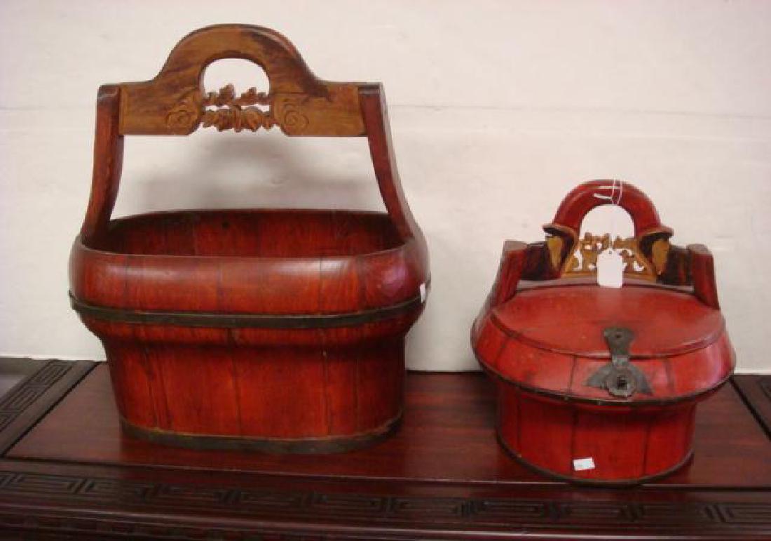 Antique Oriental Lunchbox and Open Basket: Antique Oriental Lunchbox and Open Basket Red Ground Painted Oriental Lidded Lunch Box Measures 11" x 13" x 12". Carved Handle in Open Bucket/Basket Measures 18" x 18" x 10". (100-200)