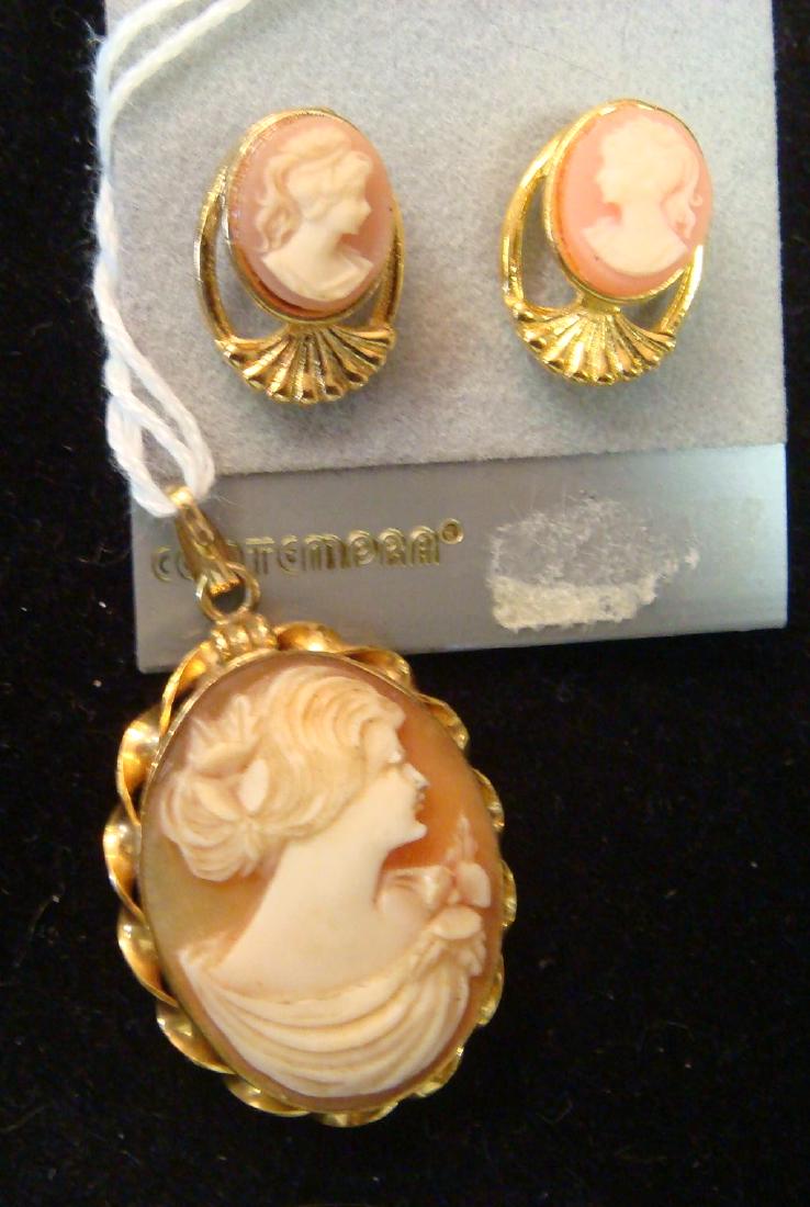 Shell Cameo Locket and Earrings:: Shell Cameo Locket and Earrings: Goldtone Locket with Open Twist Edge and Interior Picture Frame. Contemporary Pierced Earrings. (80-160)