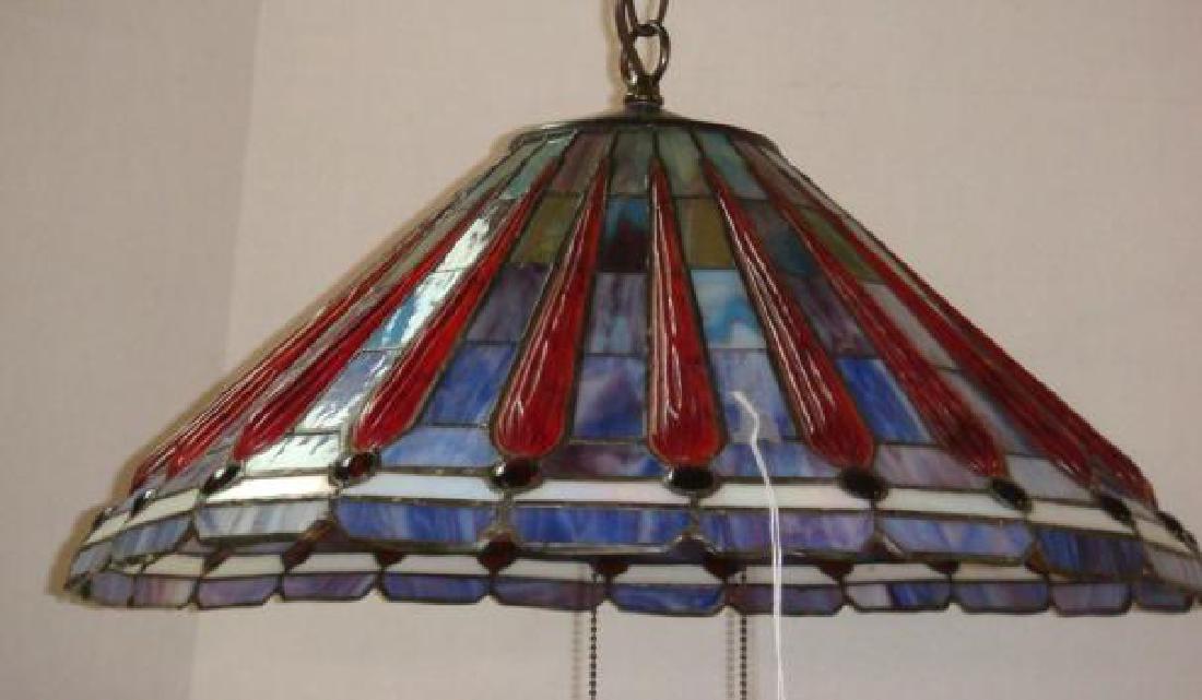 Tiffany Inspired Stained Glass Ceiling Light:: Tiffany Inspired Stained Glass Ceiling Light: Three Lights with Pull Chain. Panels of Blue Glass Shading to Green Separated by Elongated Tear Drops Ending in Red Cabochon Jewels. 19"D with Notched Edg