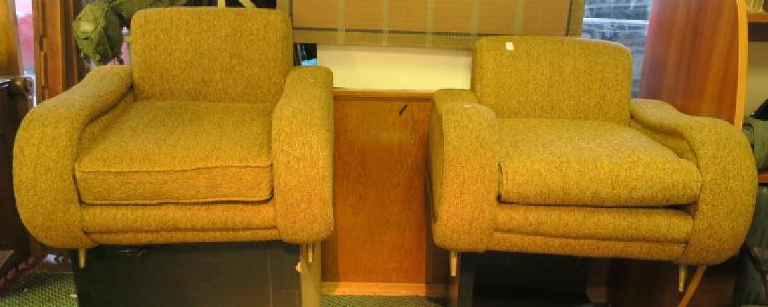 Pair of Mid Century Upholstered Lounge Chairs:: Pair of Mid Century Upholstered Lounge Chairs: Retro Sculptural Look with Cord Detailing. The Silhouette Features Wide Set Rolled Arms and Plush Seating for Sink In Comfort. Perfect for Your Reading R