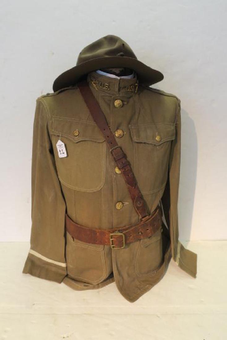 80th Div. WW I Summer Weight Officer's Tunic & Hat:: 80th Div. WW I Summer Weight Officer's Tunic & Hat: Stetson Montana Peak Officers Campaign Hat (Moth Hole). 318th Infantry Regiment and US Brass. Sam Browne Belt (Missing Sword Grommet). 1st Lieutenan