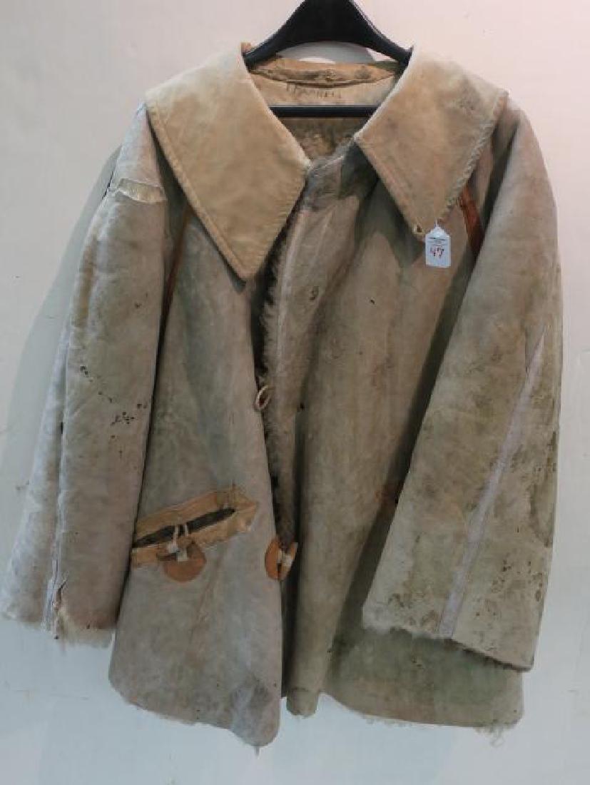 World War II German Winter Sentry Jacket:: World War II German Winter Sentry Jacket: Designed for the intense cold of Russian Steppes this Leather Fleece Lined Jacket with toggles fit over the Regular Uniform to Keep Sentries Warm on Duty. Cap