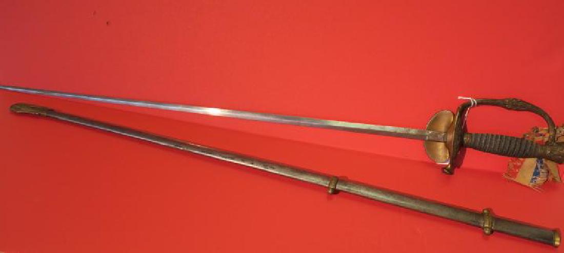 UNION Officers Dress Small Sword:: UNION Officers Dress Small Sword: Hilt and composition Handle with Wire Wrap, Decorated with Union Eagles and Red, White and Blue Antique GAR Ribbon. 38" LOA with 29" Rapier Style Blade. Very Good Con