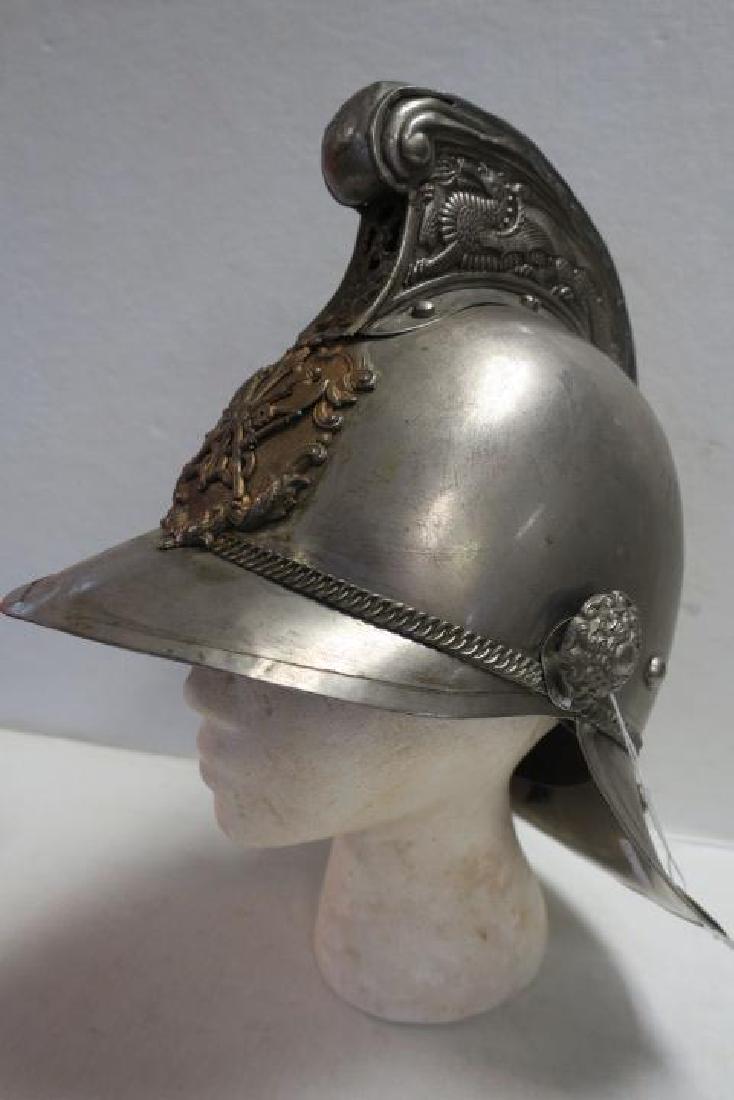 Napoleonic Style French Sapper Helmet:: Napoleonic Style French Sapper Helmet: Metal Helmet with Greek Style Crest with Flying Dragons on Each Side, French Pioneer or Sapper Crest Metal Brim and Back Neck Protection. 11" x 12" x 9". (250-70