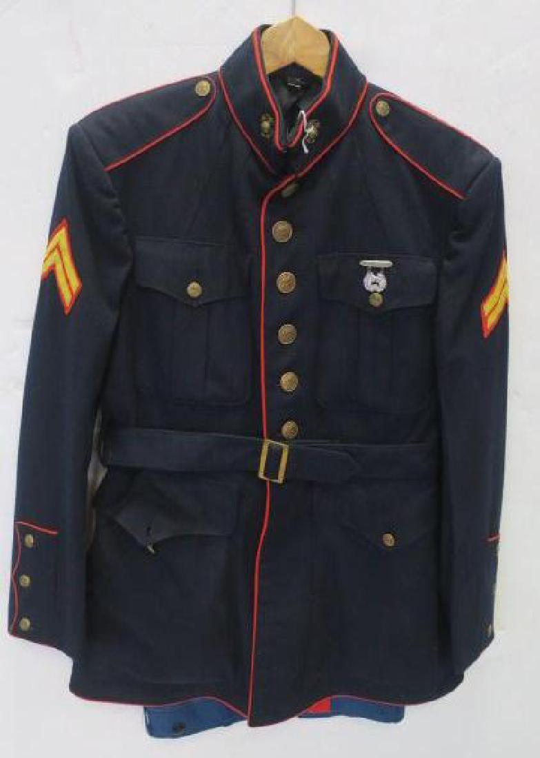 USMC DRESS BLUE UNIFORM, Jacket, Trousers & Hat:: USMC DRESS BLUE UNIFORM, Jacket, Trousers & Hat: Blue Jacket with Buttons, corporal Stripes and Pistol Expert Badge. USMC Brass on Collar. Cloth Belt with Buckle, Size 40 R, Light Blue Trousers with R
