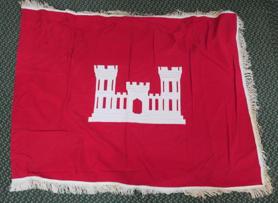 US ARMY CORPS OF ENGINEERS FLAG:: US ARMY CORPS OF ENGINEERS FLAG: Red Ground with White Engineer Castle, White Fringe, 3' x 5'. Very Good Condition (200-400)