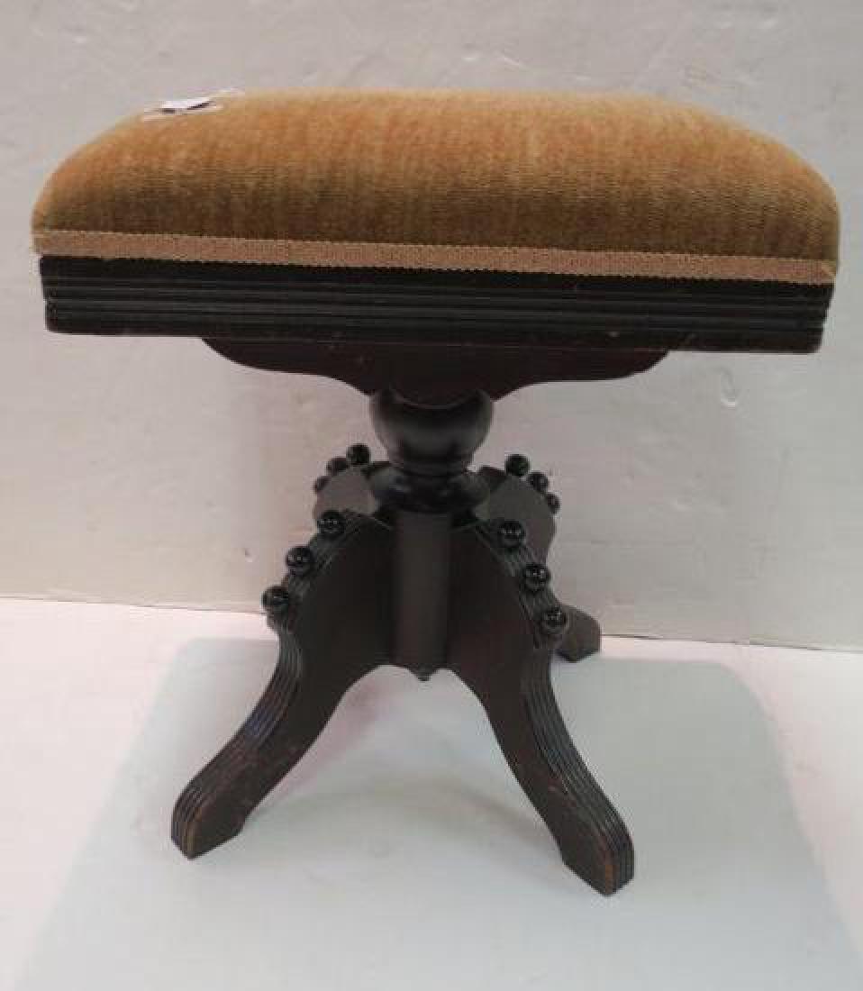 Eastlake Piano Bench with Velvet Seat:: Eastlake Piano Bench with Velvet Seat: Padded and Upholstered Swivel Seat with Braid Trim. Line Carved Sear Rail with Applied Sculpted Drops on All Sides. Turned and Tubular Stem, 4 Way Splayed Legs w