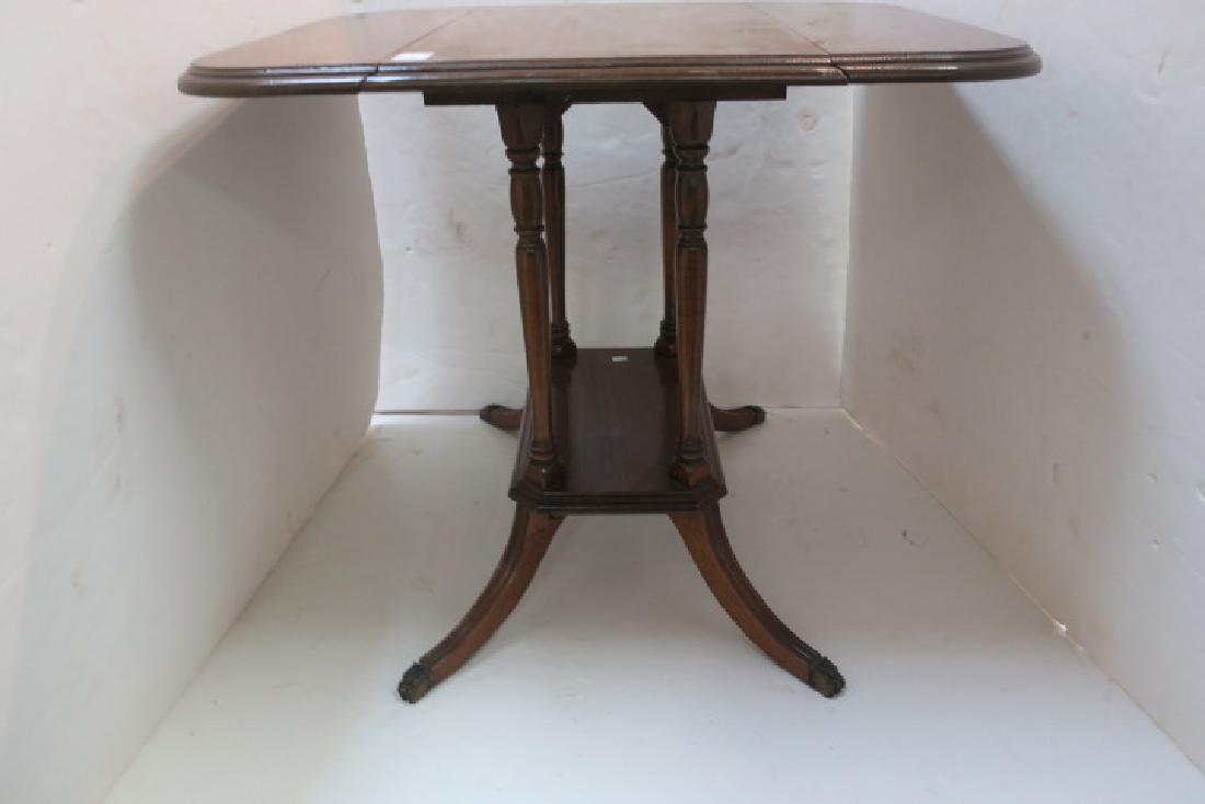 Duncan Phyfe Oak Drop Leaf Platform Side Table:: Duncan Phyfe Oak Drop Leaf Platform Side Table: Four Turned Supports on Lower Platform. Four Legs End in Animal Paw Feet. 25" X 24" X 14" with 7" Drops. (100-200)