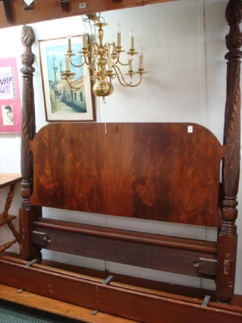 Figured Walnut Queen Size Carved Poster Bed:: Figured Walnut Queen Size Carved Poster Bed: Headboard and Footboard with Side Rails. Posts are Fully Carved topped with Flame Finials to Foliate Carvings Continuing to Ring & Vase. 76"T X 61"W. (500-