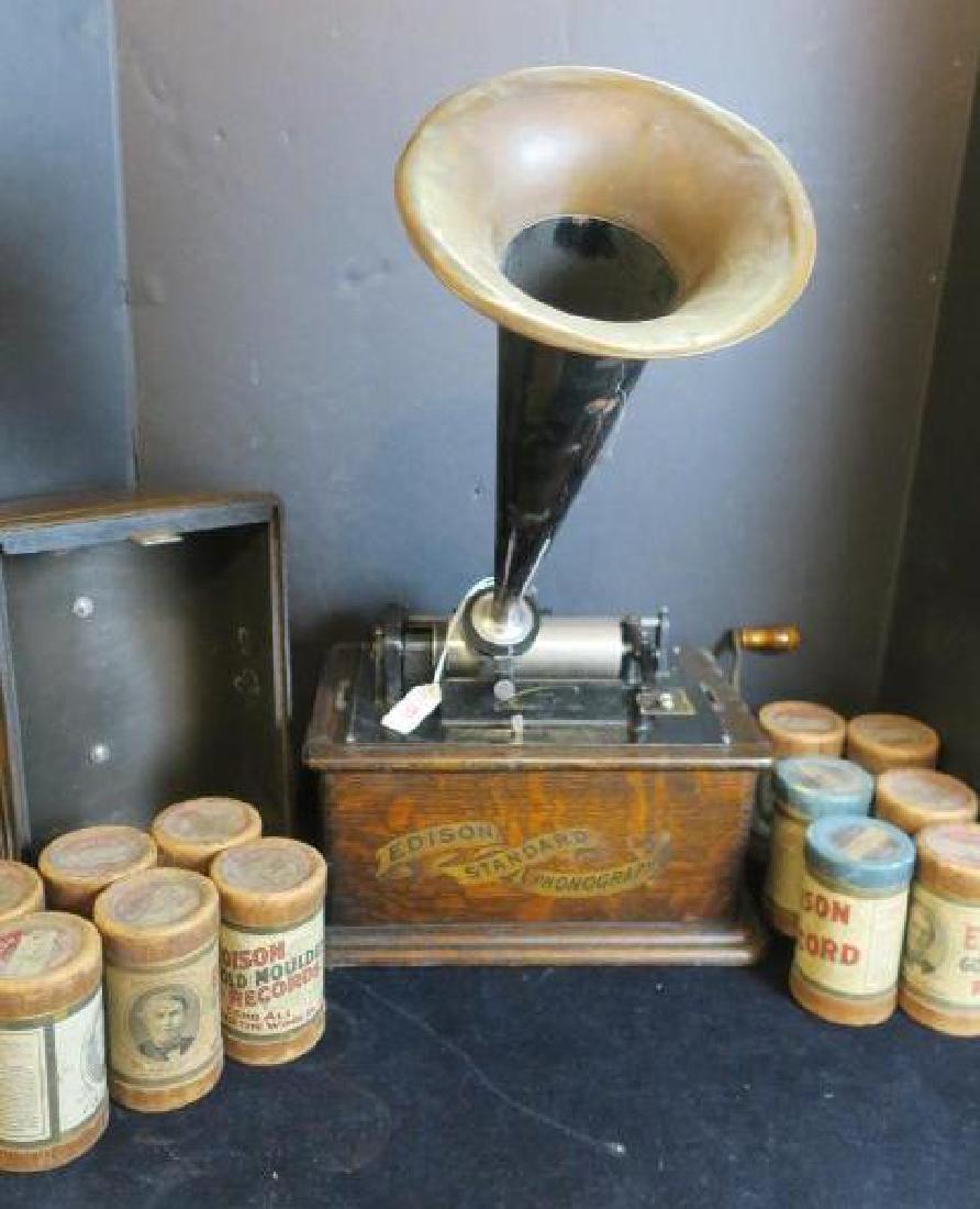 EDISON STANDARD PHONOGRAPH in Oak Case with Horn:: EDISON STANDARD PHONOGRAPH in Oak Case with Horn: Hand Crank and Dome Lid. Serial #5288496, Last Patent Date Nov 17 1903. 9" x 13" x 11", Horn is 14" Long. with 12 Music Cylinders in Cases, Popular so