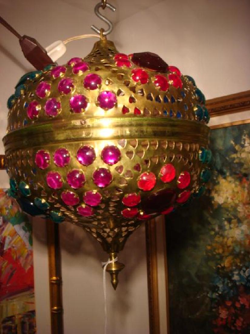 Ornamental Brass Fretwork Moroccan Style Lantern:: Ornamental Brass Fretwork Moroccan Style Lantern: Latticework Hanging Pendant Light with Prong Set Cabochon Jewels Adding Color to the Diffused Array of Shadows Across the Room. Drop Finial at Base. P