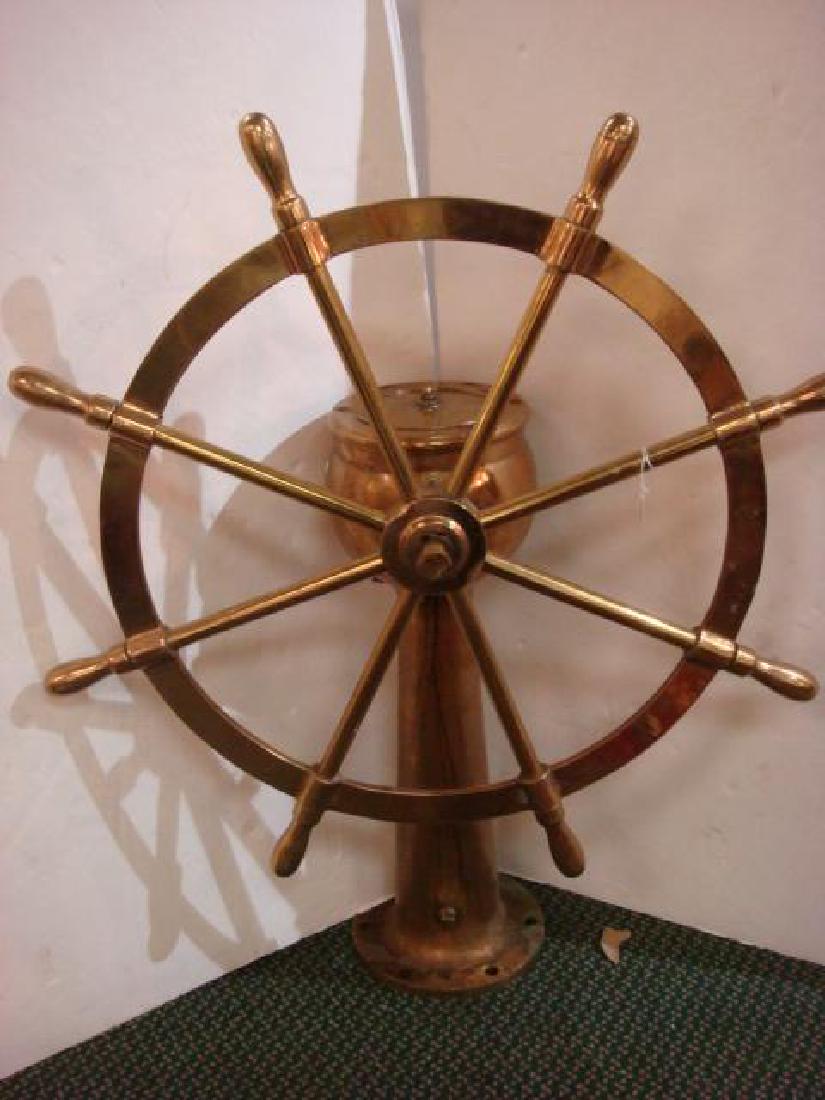 Large Solid Brass Ship's Wheel with Pedestal Stand:: Large Solid Brass Ship's Wheel with Pedestal Stand: Eight Spokes Brass Ship's Wheel on 35" Tall, 11" Solid Brass Pedestal Mounting. Estimated Weight 200 Lbs. Perfect Conversation Piece for the Man Cav