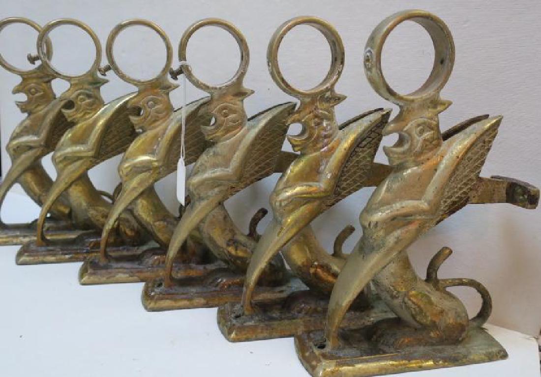 Six Brass Stylized Griffin Bar Rail Brackets:: Six Brass Stylized Griffin Bar Rail Brackets: Snarling Winged Beasts Mount to Bar and Support Foot Rail For Your Man cave. 10 1/2" x 2" x 6". Aged Patina Amazon has for $108.00 Each. (300-500)