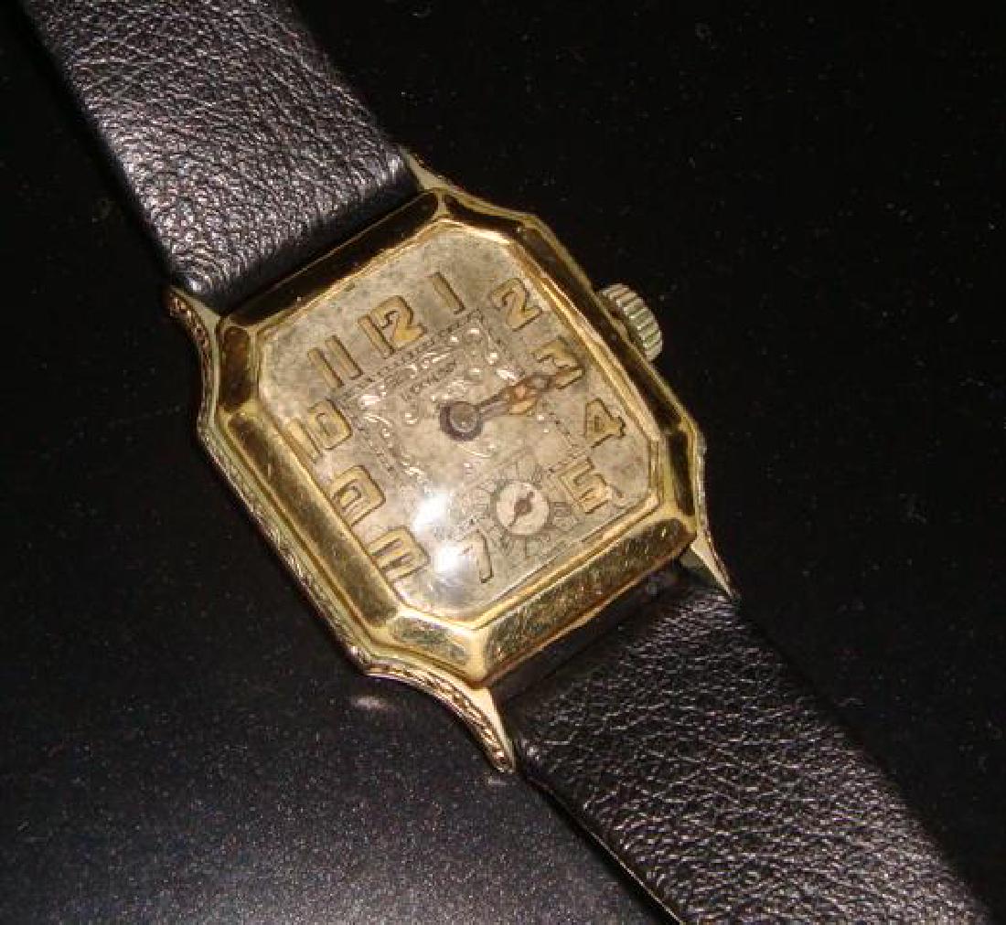 Very Rare Swiss Made LUCKY LINDY WATCH CO Wrist Watch:: Very Rare Swiss Made LUCKY LINDY WATCH CO Wrist Watch: Marked on Works, 15 Jewels, 2 Adjust, Lucky Lindy Watch Co. New York. Second Hand at Bottom. Rolled Plate Case, Leather Band. Working Condition b