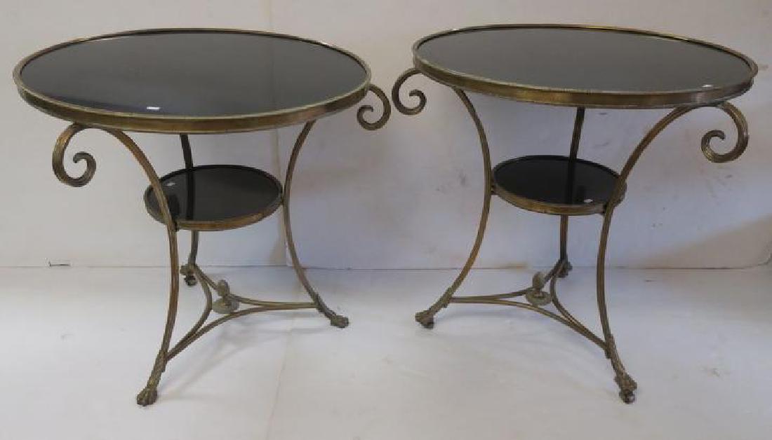 Pair of Gold Metal Framed Two Tier Round Tables:: Pair of Gold Metal Framed Two Tier Round Tables: Modern Side Tables with Open Scroll Detailing, Supporting Black Acrylic Top Ending in Paw Feet. Triangular Stretcher with Centered Finial. 27"D, 28"T.