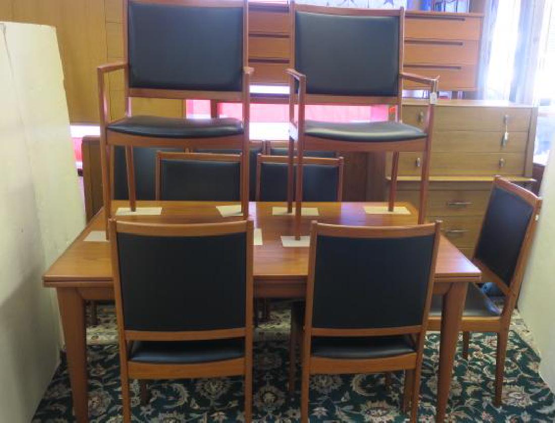 J L MOLLER MODELS Dining Room Table & Eight Chairs:: J L MOLLER MODELS Dining Room Table & Eight Chairs: Modern Style "MADE IN DENMARK" Pull out Table, 29" x 58" x 39 1/2" with 22 1/2" Pulls to103" Total Top. Peg Construction Two Arm and Six Side, Moder