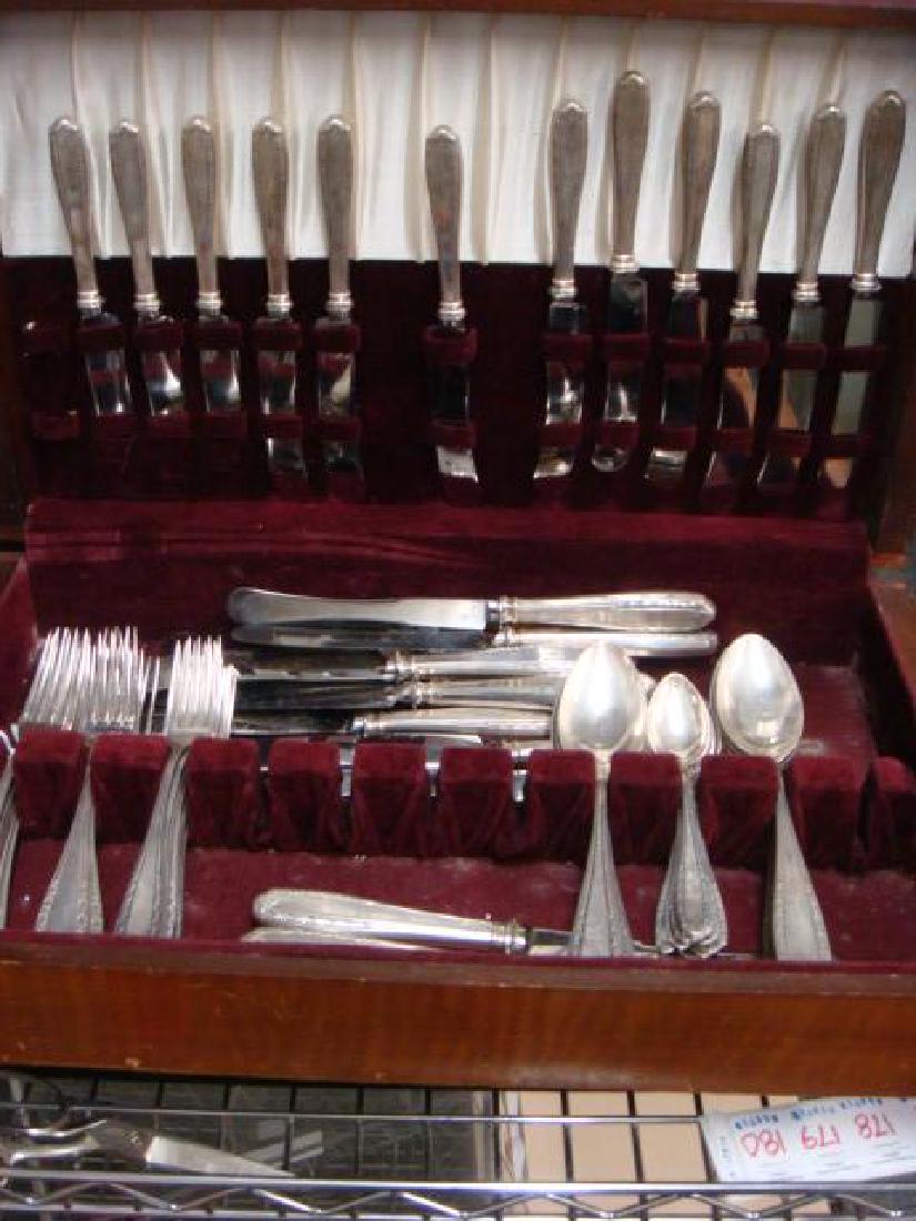 German 800 Silver Flatware Service for 12:: German 800 Silver Flatware Service for 12: Mark Possibly Gebruder Reiner, Ca. 1910. Includes 12 Each 8 1/4" and 7" Forks, 5 1/2" Teaspoons, 8 1/4" Tablespoons, 8 1/2" and 10" Knives. 83.9 Oz Minus Kni
