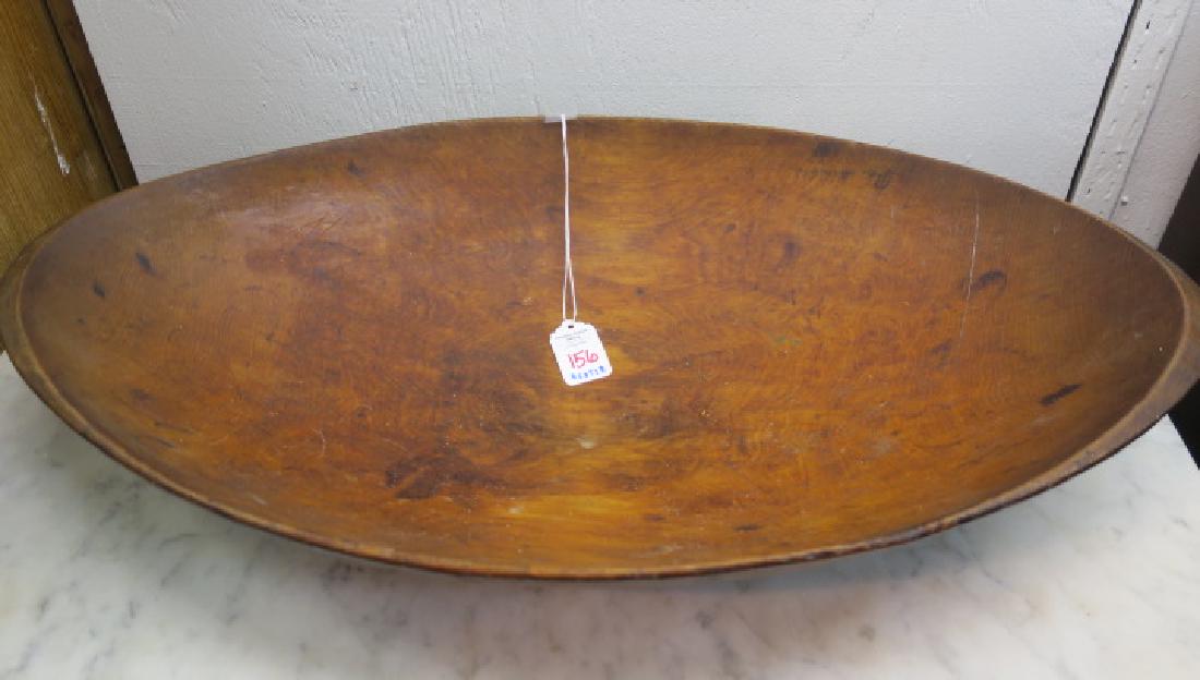 Hand turned Antique Trencher Dough Bread Bowl:: Hand turned Antique Trencher Dough Bread Bowl: Primitive Oval Honey Toned Hardwood Bowl Measures 22" X 13". Not Excessively Used. Provided a Place for Bread to Rise Before Baking Since Wood Retains He