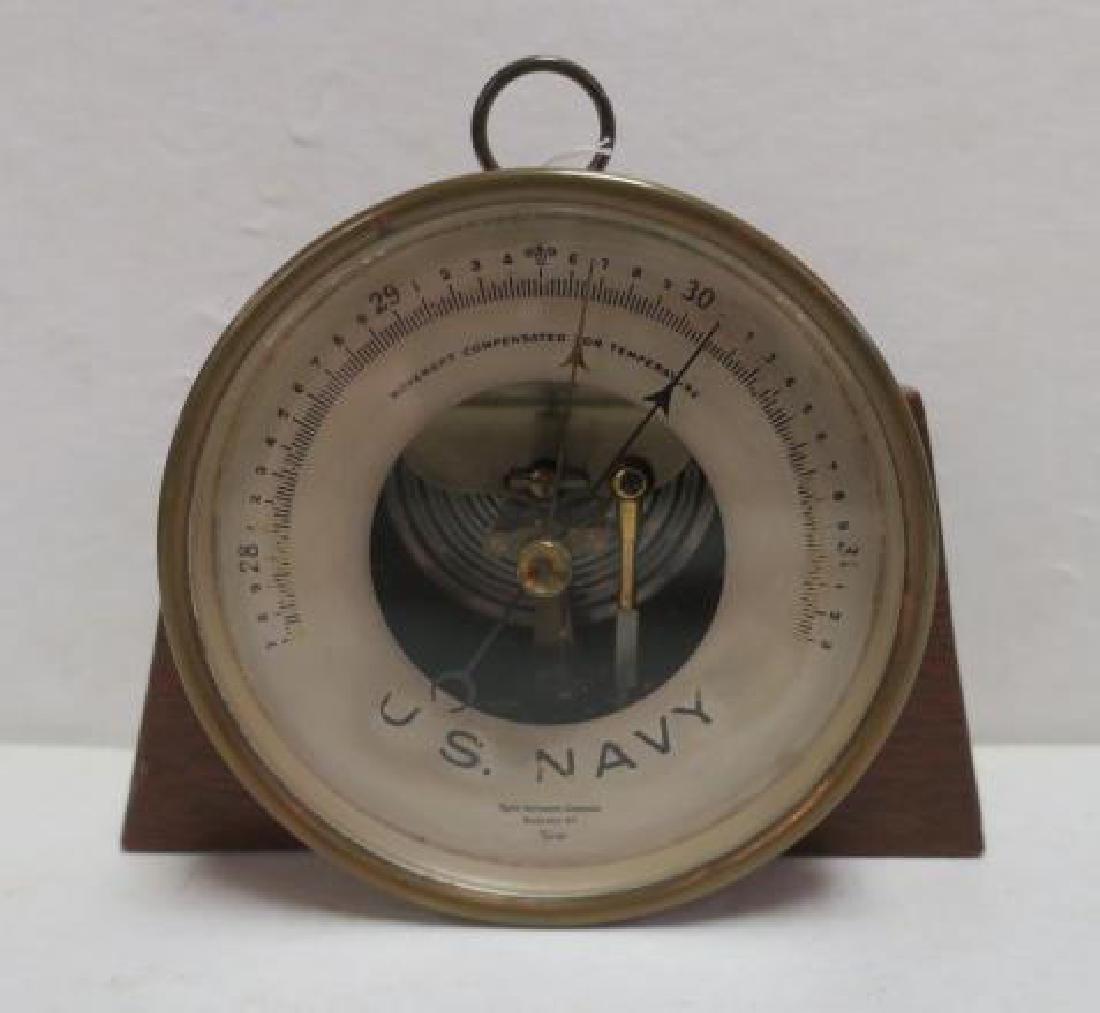 US NAVY TAYLOR INSTRUMENT CO. Brass Desk Barometer:: US NAVY TAYLOR INSTRUMENT CO. Brass Desk Barometer: Navy Wall Mounted Barometer Modified with Wooden Stand for Desk Use. 6" x &" x 3". (80-150)