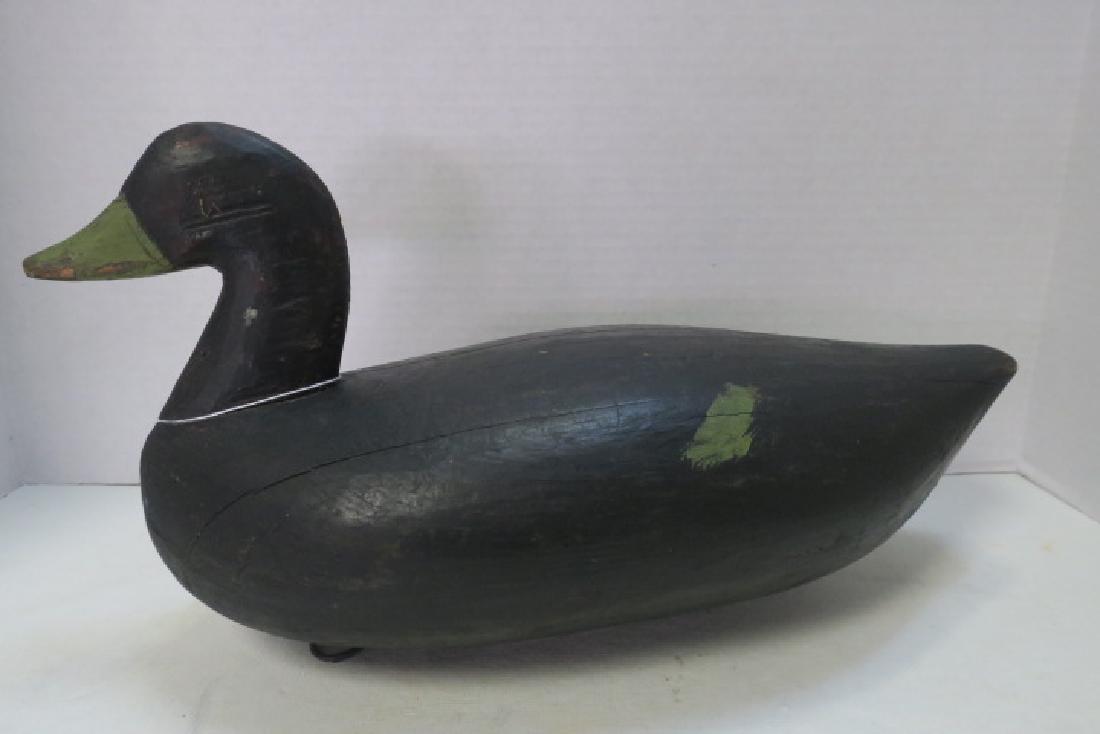 Vintage Working Black Duck Decoy, CA 1930:: Vintage Working Black Duck Decoy, CA 1930: Black Painted Head and Body with Green Bill and Splashes of Paint. With Keel and Anchoring Ring for Duck Line. 9" x 16" x 18" (80-150)