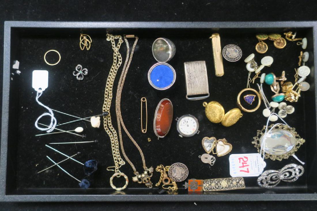 Assortment of Costume Jewelry and Trinkets:: Assortment of Costume Jewelry and Trinkets: Group of Cuff Links, Studs and Clips. Pocket Knife Case, Brooches, Lockets, Wrist Watch Face, Necklace with Pearl Pendant, Stick Pins, Key Ring and More. (1