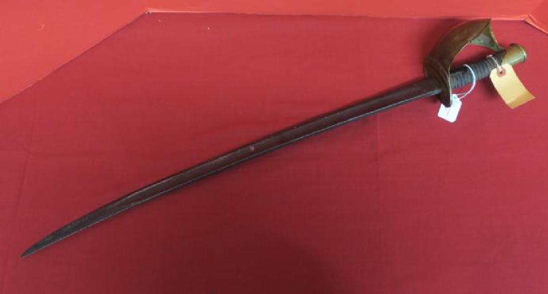 US NAVAL CUTLASS MODEL 1860 AMES CO. DTD 1862:: US NAVAL CUTLASS MODEL 1860 AMES CO. DTD 1862: Used by the Navy From the Civil War through World War II. Curved Blade with Single Edge, Helmet Shaped Guard and Brass Knuckle-Bow. SN 8M782, 32" LOA, Bl