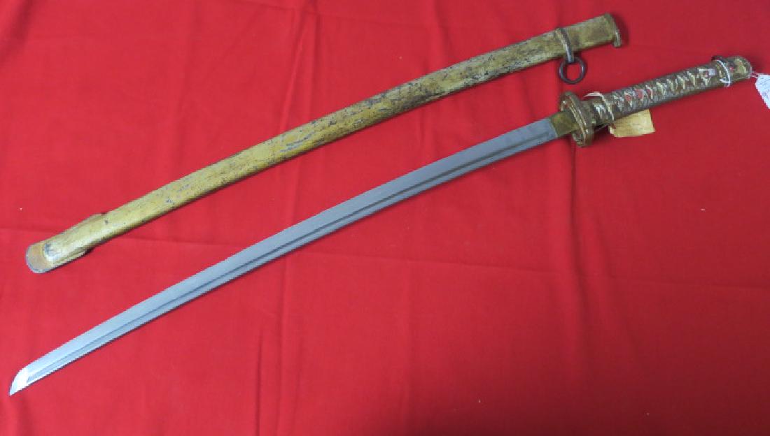 WORLD WAR II JAPANESE NON-COMMISSIONED OFFICERS SWORD:: WORLD WAR II JAPANESE NON-COMMISSIONED OFFICERS SWORD: SN 51647, KOISHIKAWA ARSENAL Control Stamp and Mark. Machine Made Blade, Cast Aluminum Hilt in Pattern of an Officer's SHIN-QUNTO. 27" Chisel Poi