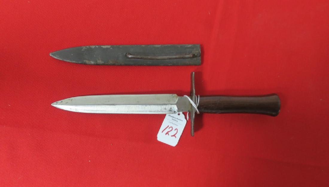FRENCH 1916 WORLD WAR I TRENCH COMBAT FIGHTING Knife:: FRENCH 1916 WORLD WAR I TRENCH COMBAT FIGHTING Knife: Stiletto Style 7" Blade by ASTIER PRODON, THIERS, Straight Cross Guard and Smooth Wooden Handle. Metal scabbard with Metal Belt Loop. 12" LOA. (50
