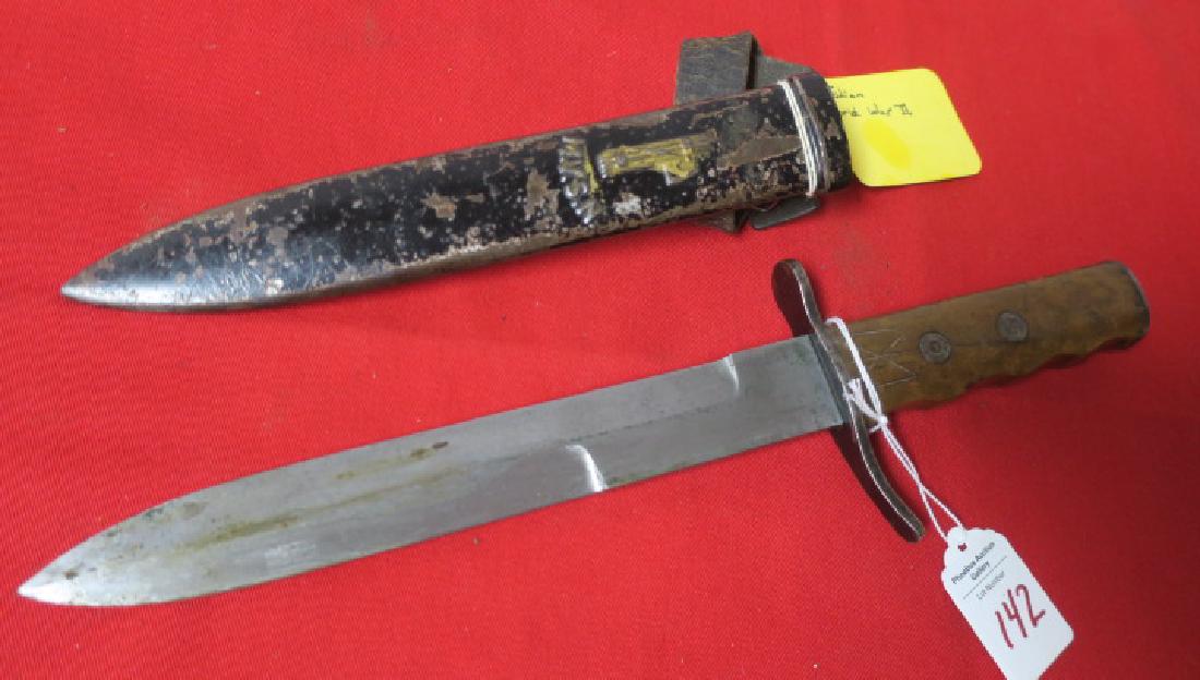 ITALIAN MVSN "FASCIST" Fighting Knife, World War II:: ITALIAN MVSN "FASCIST" Fighting Knife, World War II: Intended to be both a Dress Dagger and a Useful Combat Knife, 8 3/8" Double Sided Blade with Hilt and wood Grips, Metal Pommel. Scabbard Decorated