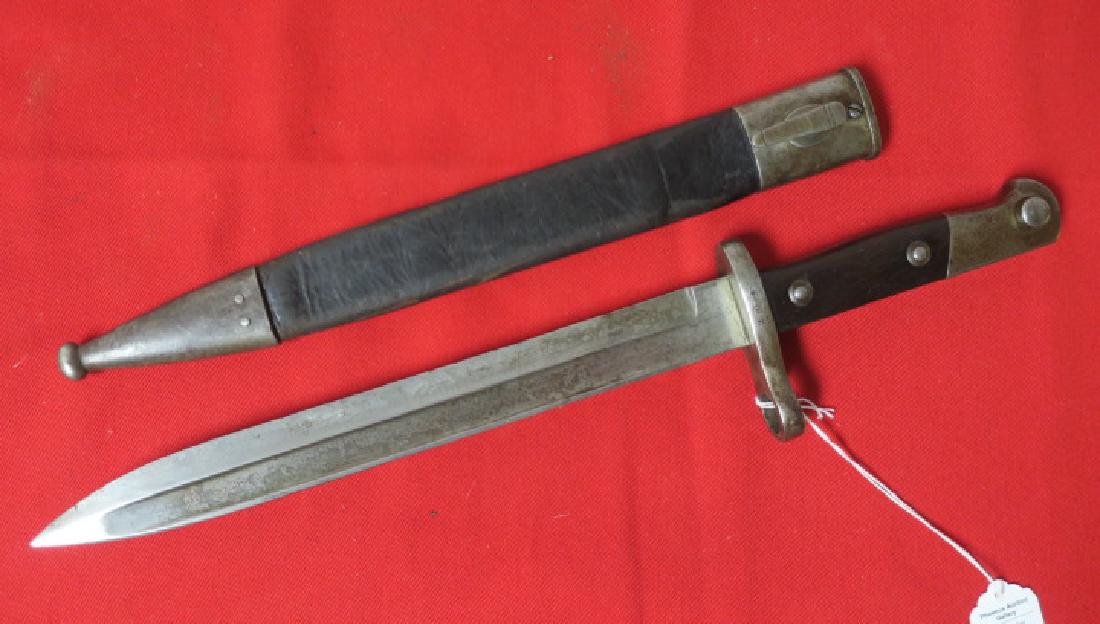 MAUSER BAYONET by WEYERSBERG KIRSCHRAUM & C, SOLINGEN: MAUSER BAYONET by WEYERSBERG KIRSCHRAUM & C, SOLINGEN so Many Different Model of Mauser Bayonets were Made it is difficult to Keep Track. 10" Blade with Fullers. Wooden Grips and Eagle Head Pommel. Le