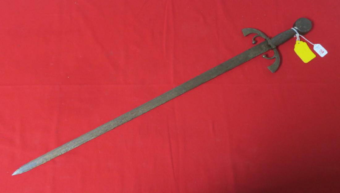 TOLEDO SPAIN "GREAT CAPTAINS SWORD":: TOLEDO SPAIN "GREAT CAPTAINS SWORD": Early 20th Century Copy of Sword of Ferdinaz de Cordeba (1453-1515) from the Wars of the Reconquista. 38" LOA, Circle Pommel Reverse Curved Hilt with Sword Breaker