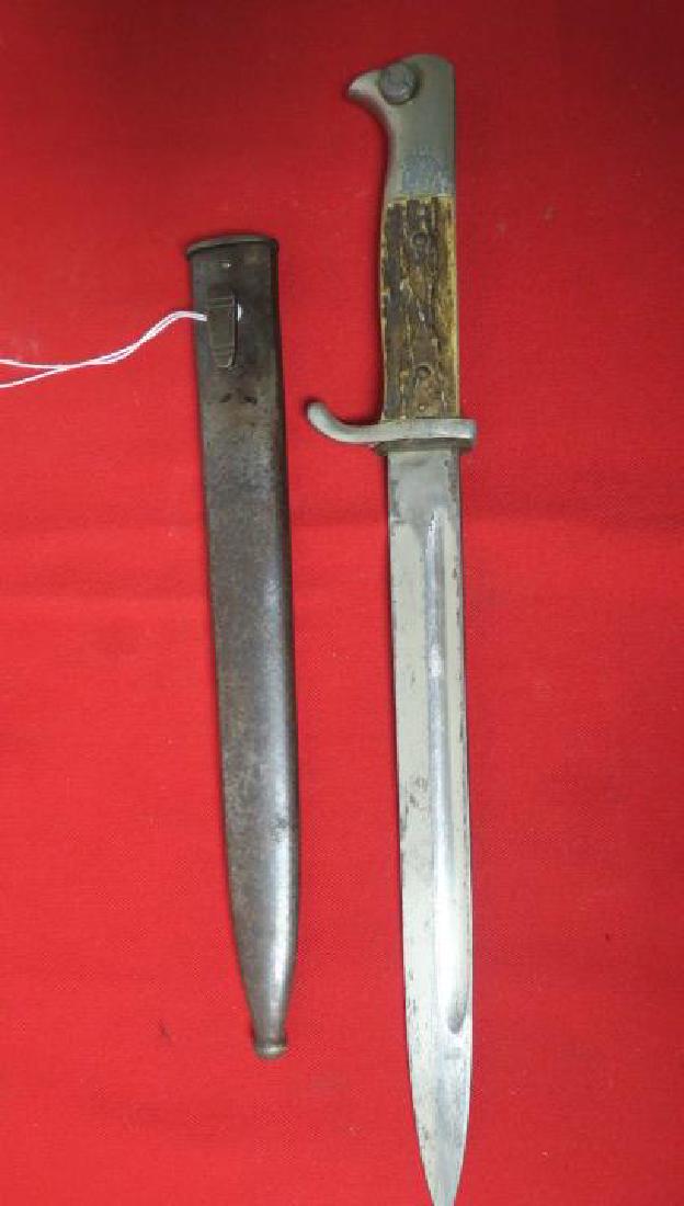 GERMAN Mauser Bayonet with Scabbard and Frog:: GERMAN Mauser Bayonet with Scabbard and Frog: Very Nice Example of this Mid World War II Bayonet, 10" Long Blade with Deep Fullers, Eagle Head Pommel Upturned Quillion and Staghorn Grips. Metal Scabba