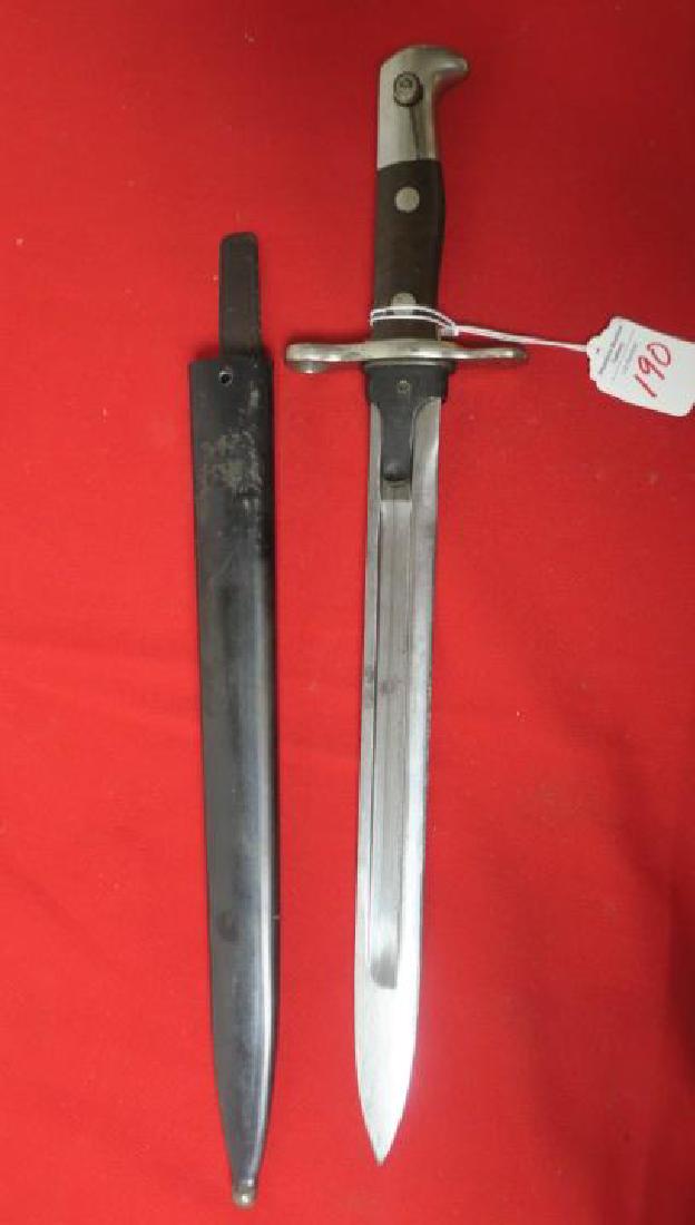 GERMAN Mauser Bayonet with Scabbard and Frog:: GERMAN Mauser Bayonet with Scabbard and Frog: Very Nice Example of this Mid World War II Bayonet, 12" Long Blade with Deep Fullers, Eagle Head Pommel Quillion and Wooden Grips. Metal Scabbard and Frog