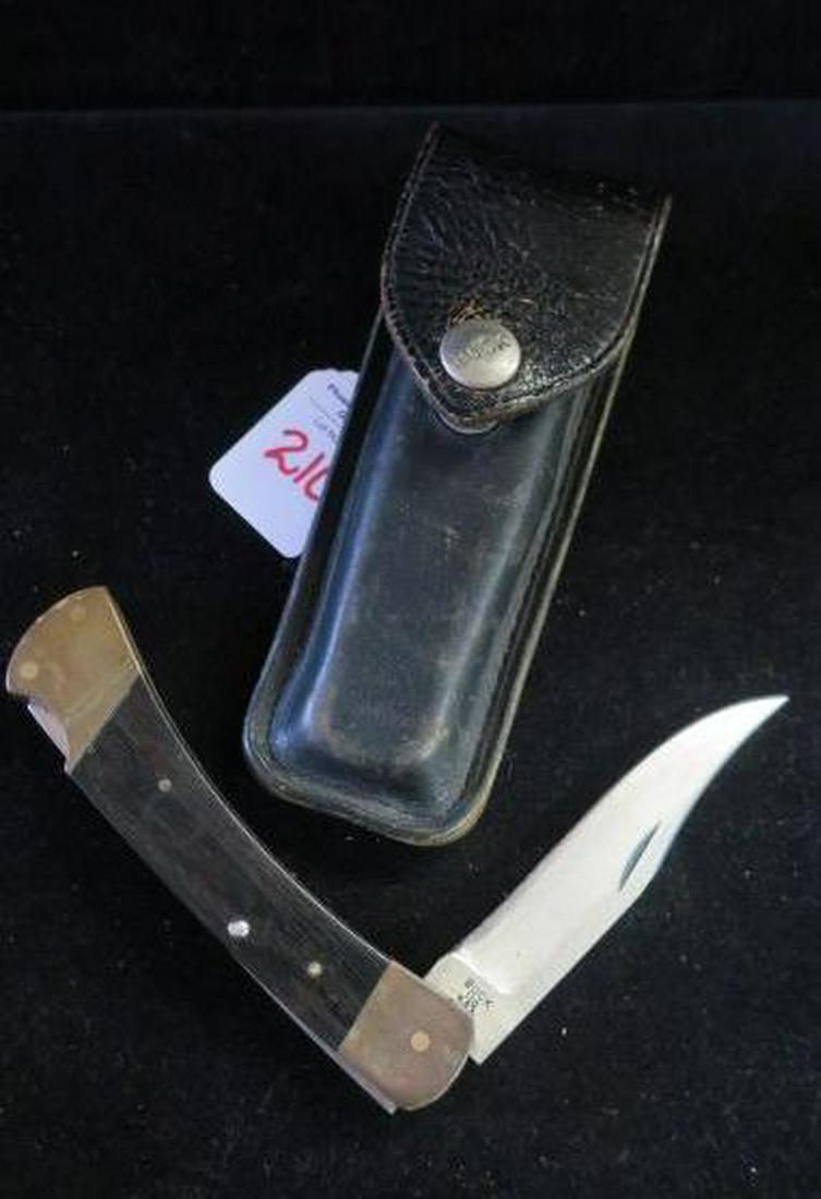BUCK Folding Locking Blade Knife with Belt Holster:: BUCK Folding Locking Blade Knife with Belt Holster: Official Buck Belt Holster. Wood Grain Grips with Brass Ends, 4" Blade. (50-100)