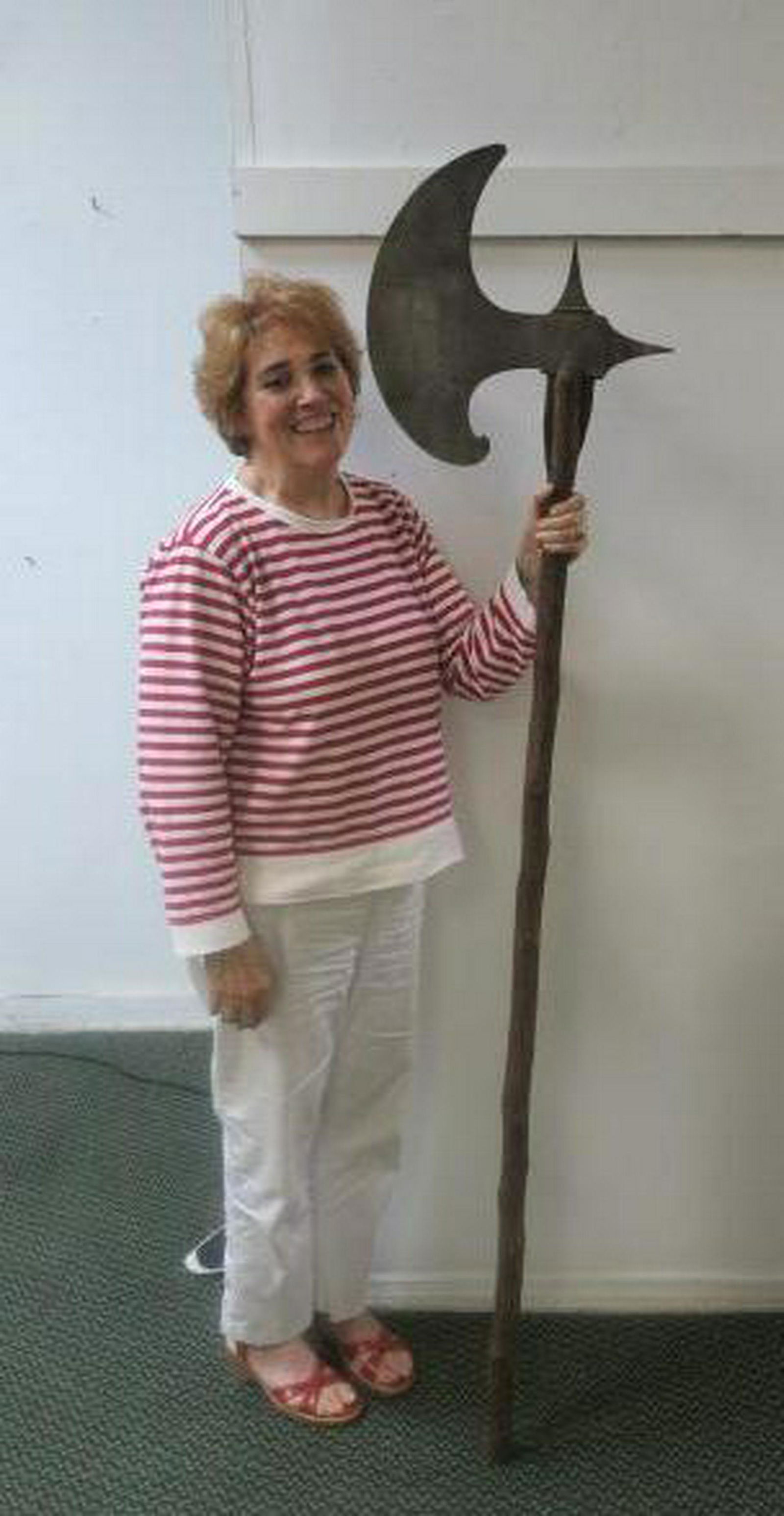 Medieval Style Battle Axe:: Medieval Style Battle Axe: Mounted on 74" Rough Hune Pole, With 16" Crescent Blade and Rear and Push Picks. Head Measures 16" x 15". Large Vicious Weapon to put the Evil Back into Medieval. (300-600)