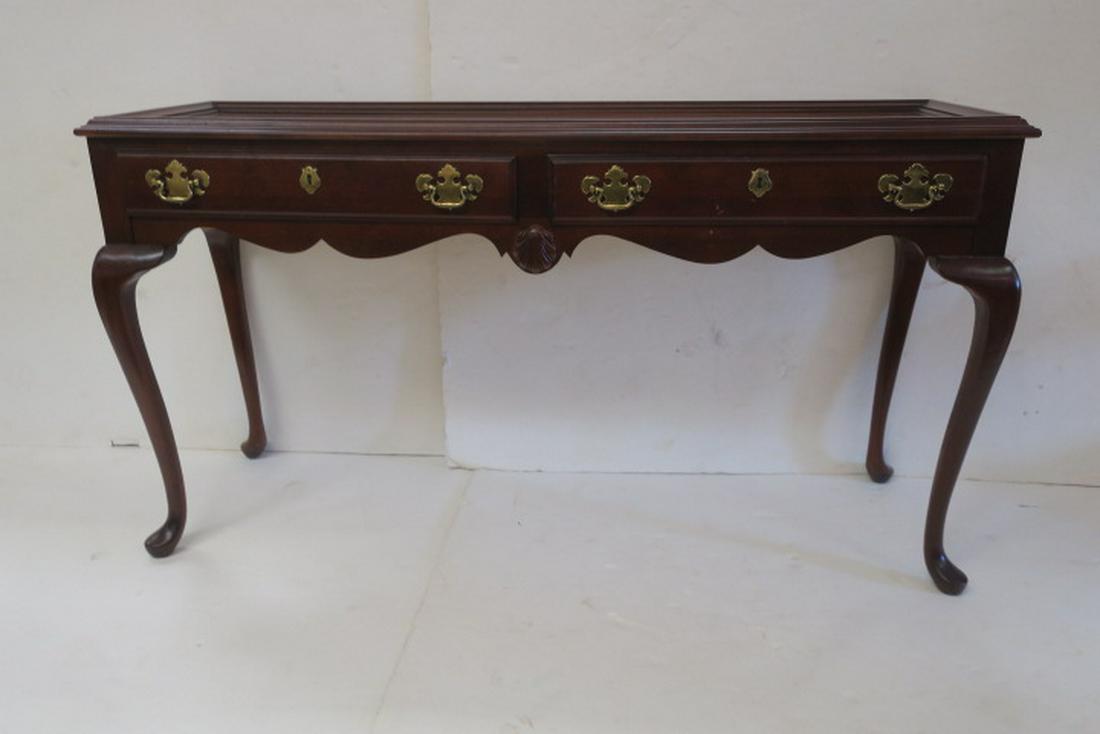 Queen Anne Style Mahogany Two Drawer Sofa Table:: Queen Anne Style Mahogany Two Drawer Sofa Table: Galleried Top. Curving Legs Ending with Pad Feet. Brass Pulls on Drawers. 29"T, 52" X 16". Some Scuffing. (100-200)