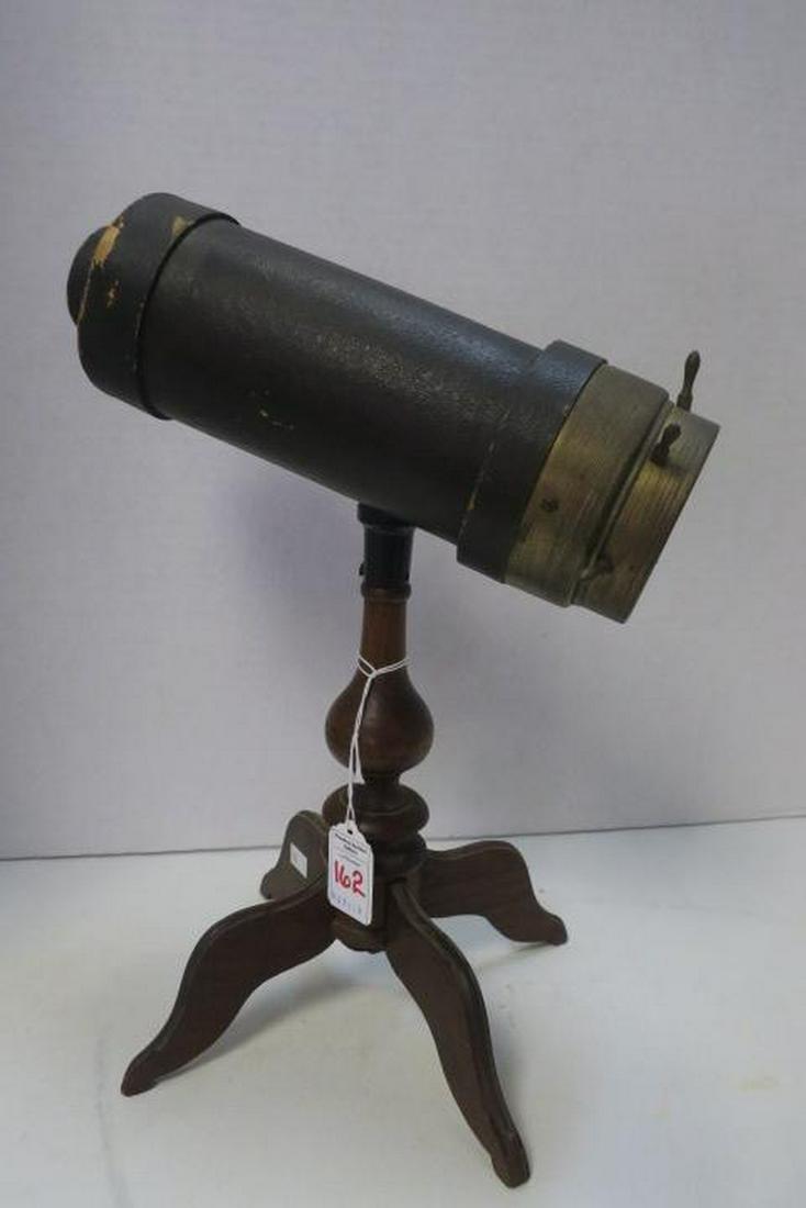 ANTIQUE CA 1874 CHARLES G BUSH Parlor Kaleidoscope:: ANTIQUE CA 1874 CHARLES G BUSH Parlor Kaleidoscope: Signed on Base. Four Legged Parlor Example with 14" Wooden Pedestal. 10.5" Barrel, 3.5" in Diameter with Ships Wheel Turning Dry Cells, 2 Mirror Sys