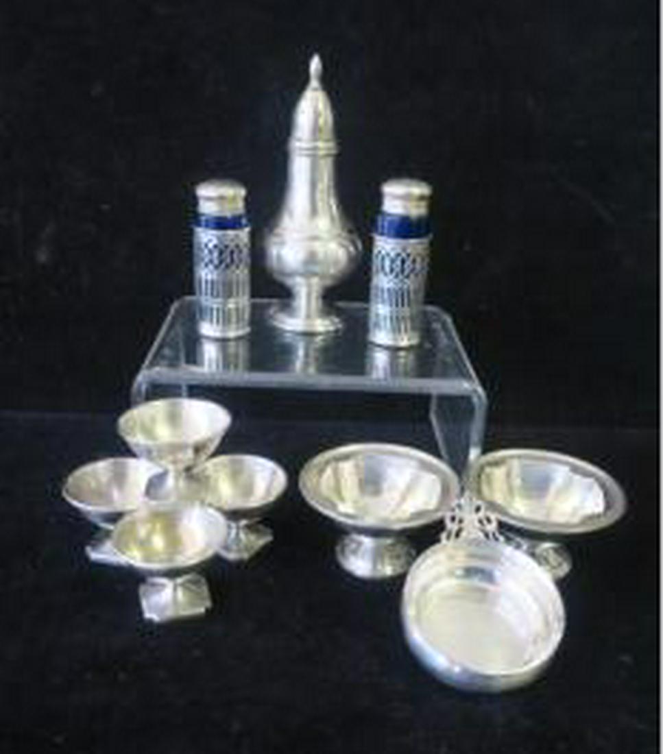 Sterling Silver Salt Cellars and Shakers:: Sterling Silver Salt Cellars and Shakers: Four Reed & Barton Pedestal 1 1/4"T Cellars, Pair of Whiting 1 1/2"T Footed Cellars, Lunt 3/4"T Porringer Style Cellar, Mueck-Carey Co 4 3/4"T Shaker, Pair of