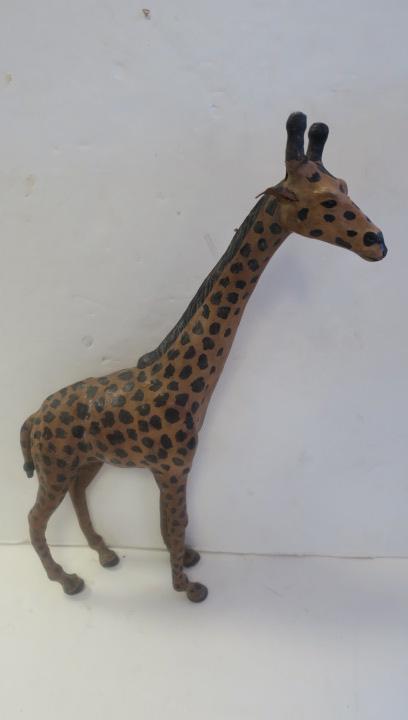Hand painted Leather Clad Giraffe Statue:: Hand painted Leather Clad Giraffe Statue: 20th C. Sculpture with Black Eyes, Ossicones and Soft Ears. His Coat Pattern is Black Spots on Yellow/Gold Skin and He Stands 28"T. Condition Proportionate wi