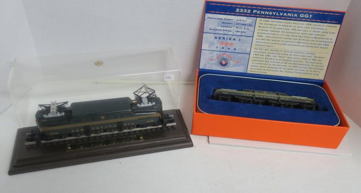 Two LIONEL CLASSIC SERIES GG1 ELECTRIC LOCOMOTIVES:: Two LIONEL CLASSIC SERIES GG1 ELECTRIC LOCOMOTIVES: HO Scale and One 1:120 Scale "LIONEL BIG RUGGED TRAINS". GG1 2332 in Special Presentation Box and Packaging. HO Scale by Hallmark/Lionel in Plastic 