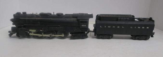 LIONEL 685 STEAM ENGINE & 234W Tender:: LIONEL 685 STEAM ENGINE & 234W Tender: Postwar 4-6-4 Locomotive and Whistle Tender 234W. Very Good Condition, Minor Paint Loss. (300-600)