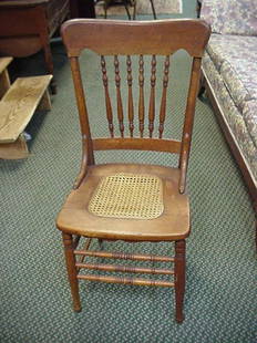 3 Oak Spindle Back with Cane Seat Chairs: 3 Oak Spindle Back with Cane Seat Chairs: 20"W X 16"D X 38"T, Turned Back Spindles and Box Stretcher, Slightly Rounded Crest Rail with Curved Ends. Woven Lace Cane Inset Seat. Turned Legs and