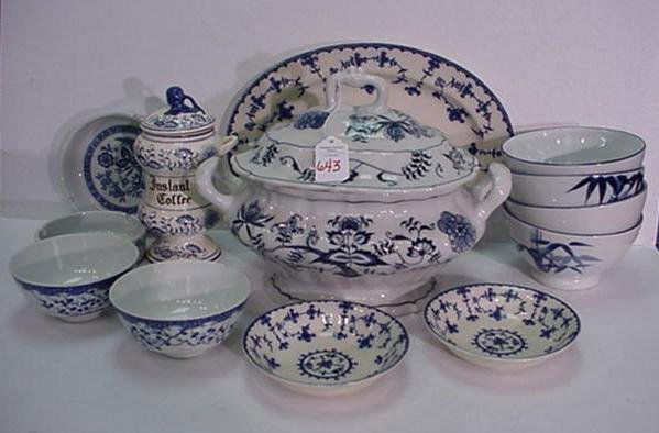 Blue and White Porcelain Tableware: 643. Blue and White Porcelain Tableware: Includes Blue Danube Covered Casserole, Blue Onion Coffee Jar, 6 Rice Bowls, 2 Ashtrays, Blue Delft Platter and 2 Saucers.